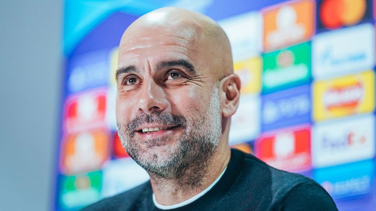 MANCHESTER, ENGLAND - FEBRUARY 14: Pep Guardiola speaking to the press prior to their clash against Sporting Lisbon at Manchester City Football Academy on February 14, 2022 in Manchester, England. (Photo by Tom Flathers/Manchester City FC via Getty Images)