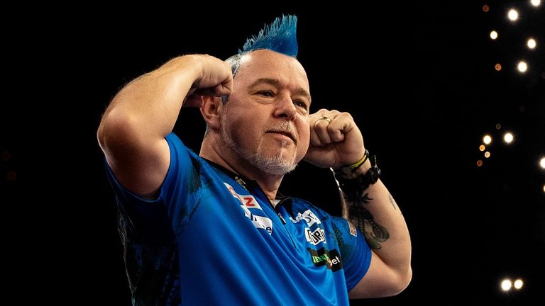 Peter Wright celebrates after winning against Jonny Clayton in the final during the 2022 Cazoo Premier League in Cardiff (Image credit: Steven Paston/PDC)