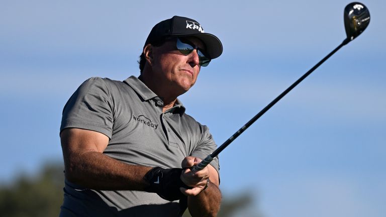 Phil Mickelson hits his tee shot on the fifth hole of the South Course at Torrey Pines during the first round of the Farmers Insurance Open golf tournament Wednesday Jan. 26, 2022, in San Diego. (AP Photo/Denis Poroy)