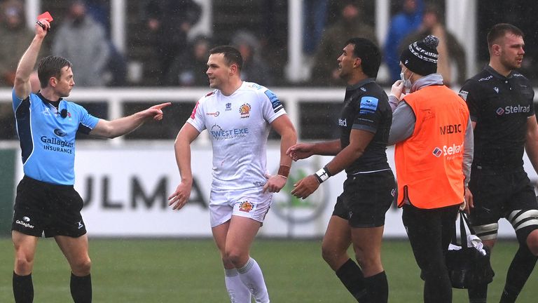 Falcons player Callum Chick (r) is sent off by referee Christophe Ridley