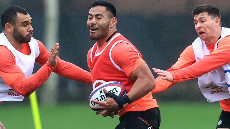 Manu Tuilagi (centre) is expected to return to England's midfield against Wales