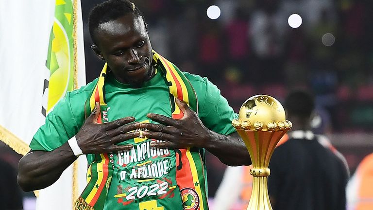 Sadio Mane celebrates winning AFCON