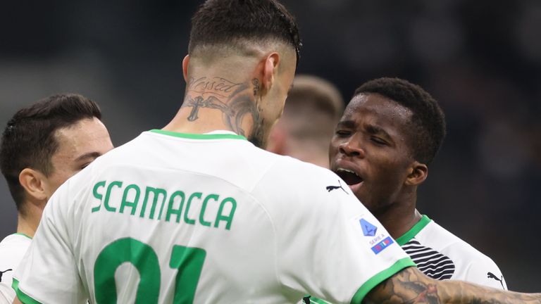  Gianluca Scamacca of US Sassuolo celebrates with team mate Hamed Junior Traore after scoring to give the side a 2-0 lead during the Serie A match between FC Internazionale and US Sassuolo at Stadio Giuseppe Meazza on February 20, 2022 in Milan, Italy.
