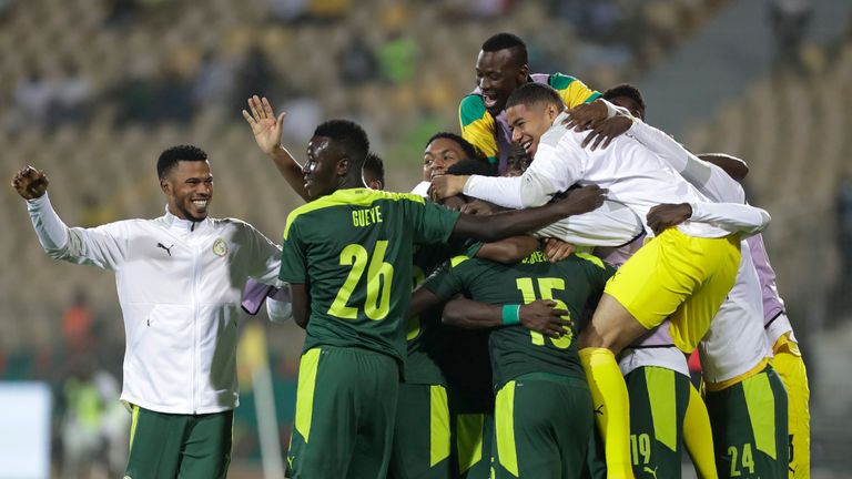 Senegal&#39;s players celebrate after winning the African Cup of Nations 2022 semi-final soccer match between Burkina Faso and Senegal at the Ahmadou Ahidjo stadium in Yaounde, Cameroon, Wednesday, Feb. 2, 2022. Senegal won 3-1. (AP Photo/Sunday Alamba)