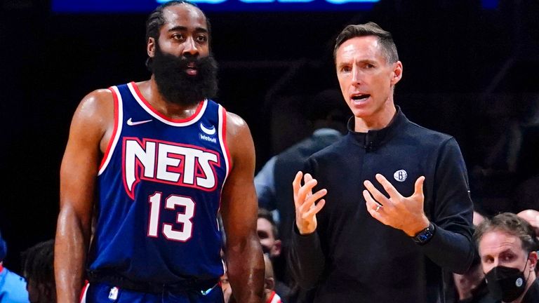 Brooklyn Nets head coach Steve Nash, right, talks to James Harden on the sideline during a clash against the Golden State Warriors in November
