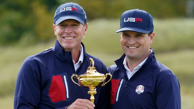 Team USA captain Steve Stricker and Zach Johnson post for a picture during a practice day at the Ryder Cup at the Whistling Straits Golf Course Wednesday, Sept. 22, 2021, in Sheboygan, Wis. (AP Photo/Charlie Neibergall)