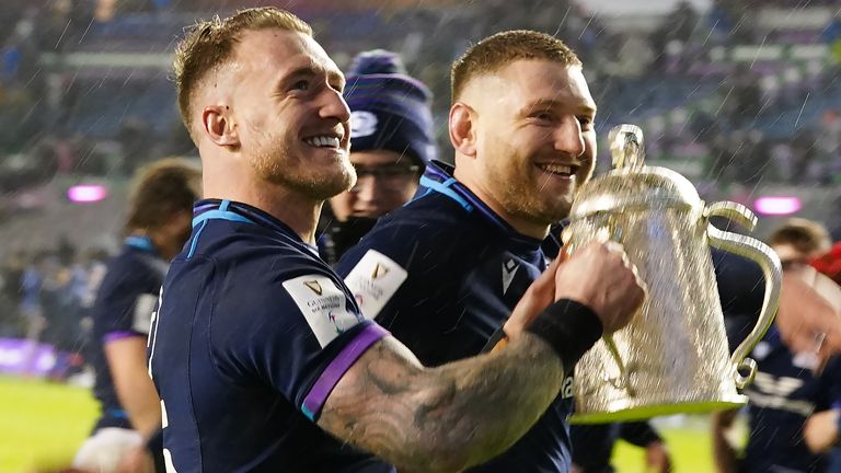 Scotland's Stuart Hogg and Finn Russell celebrate with the Calcutta Cup