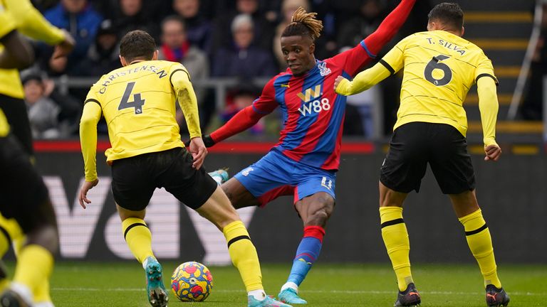 Wilfried Zaha is closed down by Andreas Chistensen and Chelsea's Thiago Silva (AP)