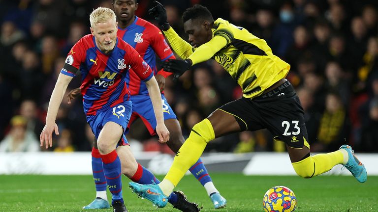 Will Hughes of Crystal Palace battles for possession with Ismaila Sarr