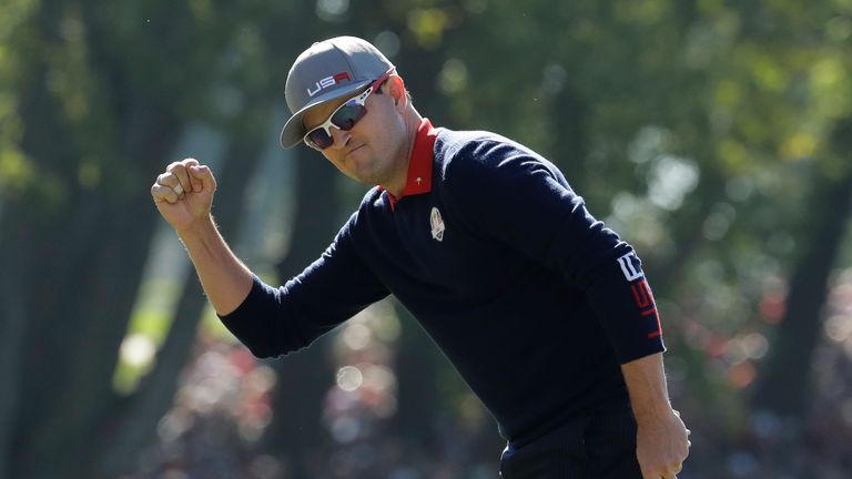 FILE - United States' Zach Johnson reacts after making a putt on 16 to win his match 4 & 2 during a foursomes match at the Ryder Cup golf tournament Friday, Sept. 30, 2016, at Hazeltine National Golf Club in Chaska, Minn. Two-time major champion Zach Johnson is taking over as Ryder Cup captain, leading an American side trying to end 30 years without a victory on European soil.