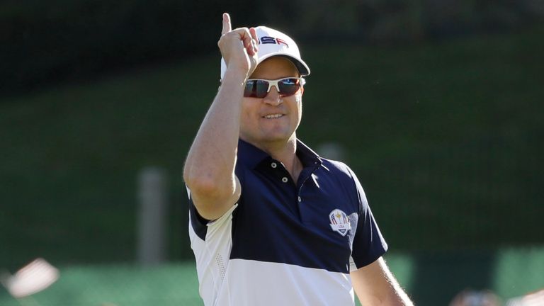 United States&#39; Zach Johnson points to fans after winning a singles match at the Ryder Cup golf tournament Sunday, Oct. 2, 2016, at Hazeltine National Golf Club in Chaska, Minn. Two-time major champion Zach Johnson is taking over as Ryder Cup captain, leading an American side trying to end 30 years without a victory on European soil.