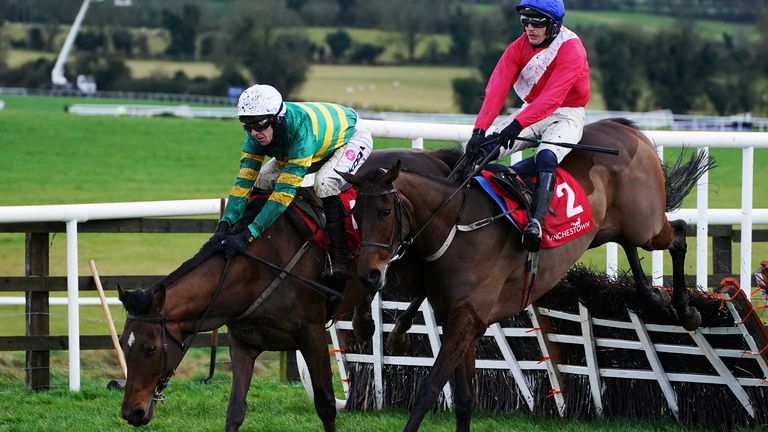 Slip Of The Tongue ridden by Mark Walsh (left) clears the last