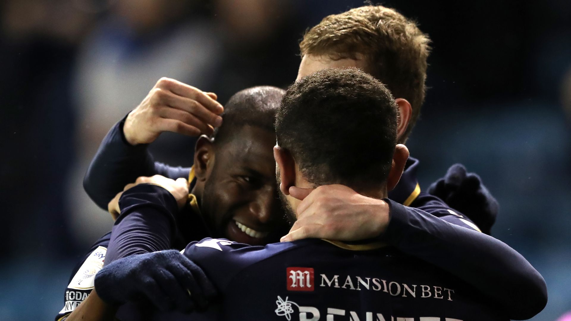 Afobe double steers Millwall to victory over Huddersfield