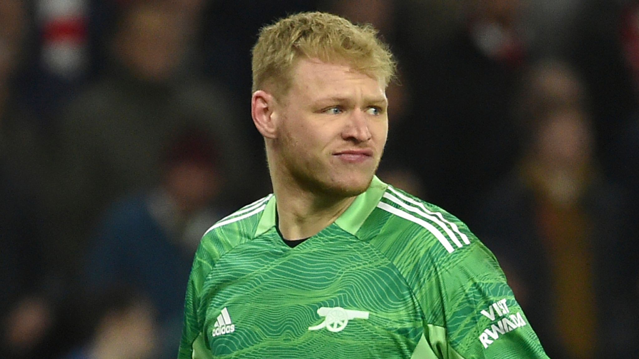 Arsenal goalkeeper Aaron Ramsdale appears to be kicked by