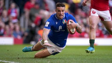 Italy's Edoardo Padovani dives in to score in the last minute