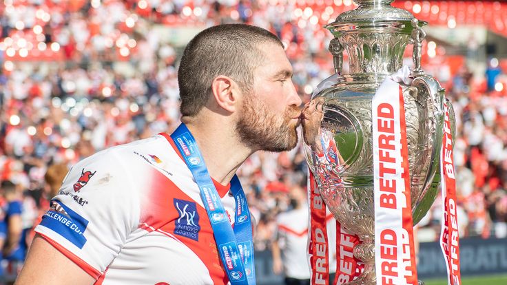 Picture by Allan McKenzie/SWpix.com - 17/07/2021 - Rugby League - Betfred Challenge Cup Final - Castleford Tigers v St Helens - Wembley Stadium, London, England - Kyle Amor kisses the Challenge Cup trophy.