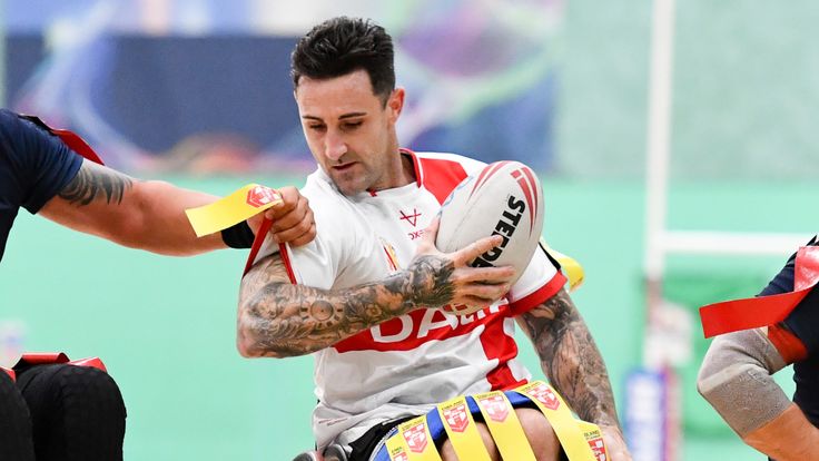 Picture by Will Palmer/SWpix.com - 13/11/2021 - Rugby League - Wheelchair International - England v France - Medway Park Sports Centre, Gillingham, England - Lewis King of England is tackled by Dany Denuwelaere of France