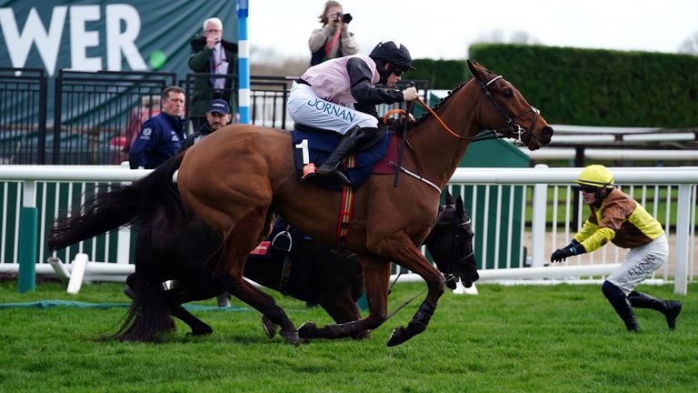 Bob Olinger ridden by Rachael Blackmore goes past faller Galopin Des Champs ridden by Paul Townend on their way to winning the Turners Novices' Chase on day three of the Cheltenham Festival at Cheltenham Racecourse. Picture date: Thursday March 17, 2022.