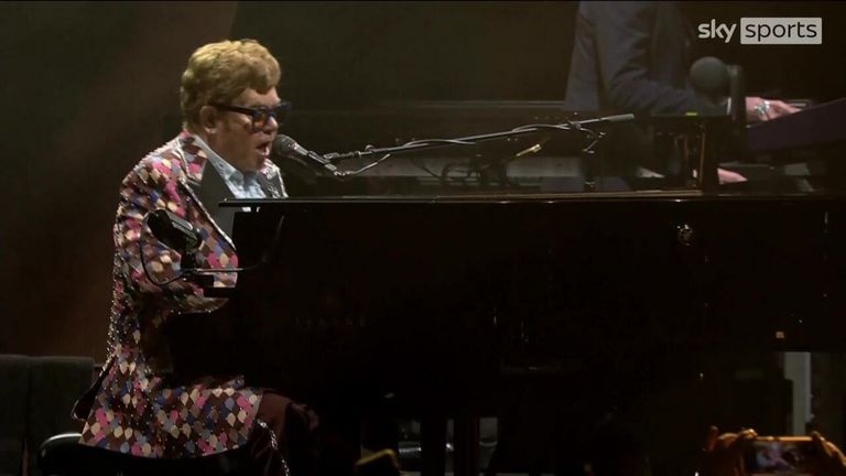 Elton John performs 'Don't let the sun go down on me' from the United States in tribute to Shane Warne for his memorial service at the MCG.