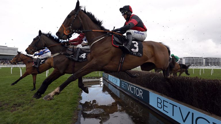 Paint The Dream ridden by jockey Connor Brace clears a fence en route to winning the BetVictor Greatwood Gold Cup
