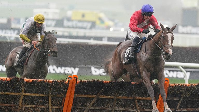 Paul Townend riding Sir Gerhard (red) clear the last to win The Ballymore Novices&#39; Hurdle