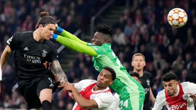 Benfica's Darwin Nunez scores his side's opening goal during the Champions League, round of 16, second leg soccer match between Ajax and Benfica at the Johan Cruyff ArenA