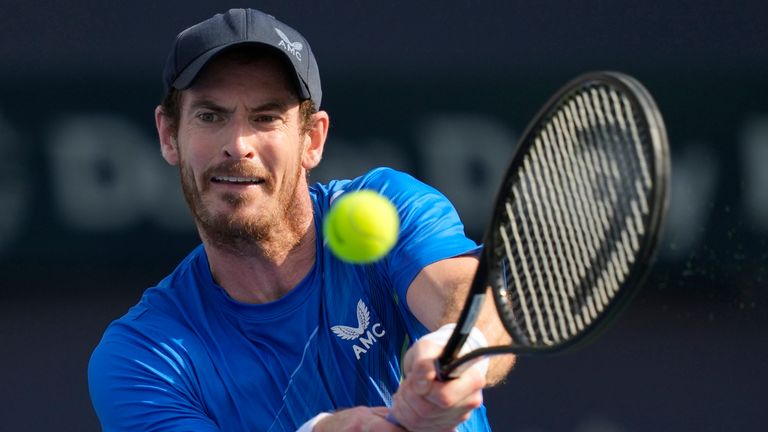 Andy Murray of Britain return the ball to Italy...s Jannik Sinner during a match of the Dubai Duty Free Tennis Championship in Dubai, United Arab Emirates, Wednesday, Feb. 23, 2022. (AP Photo/Kamran Jebreili)