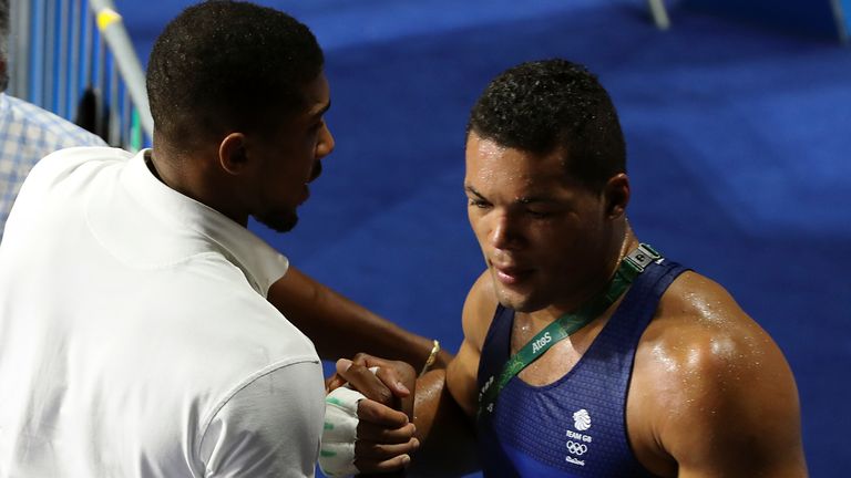 Anthony Joshua commiserates Joe Joyce following his loss in the 2016 Olympic final (PA)