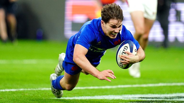 France's Antoine Dupont scores his side's third try.