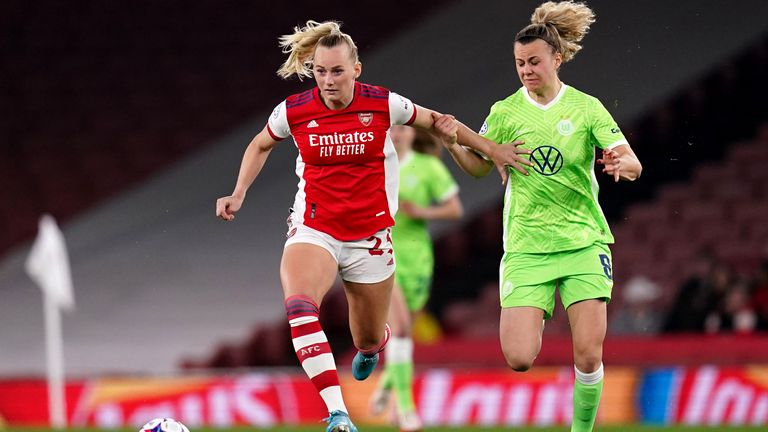 Stina Blackstenius of Arsenal (left) and Lena Latvin of Wolfsburg compete for the ball during a Champions League match.