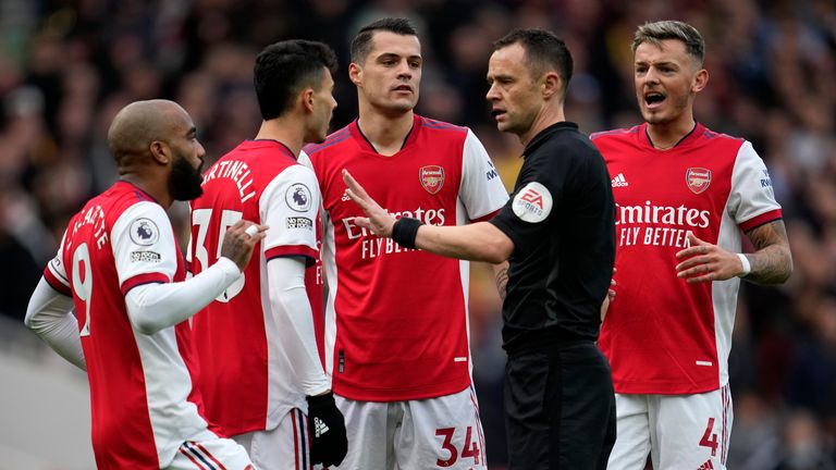 Arsneal player protest a decision during their 2-1 loss to Manchester City