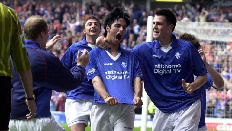Arteta (second right) scored on his first Old Firm derby clash