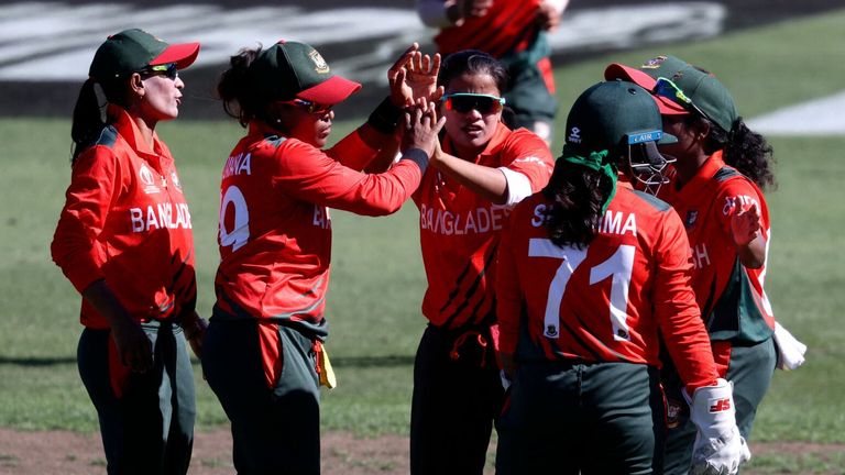 Bangladesh celebrates the wicket of Pakistans Nahida Khan during the 2022 Women&#39;s Cricket World Cup match between Pakistan and Bangladesh at Seddon Park in Hamilton on March 14, 2022. (Photo by MICHAEL BRADLEY / AFP) (Photo by MICHAEL BRADLEY/AFP via Getty Images)