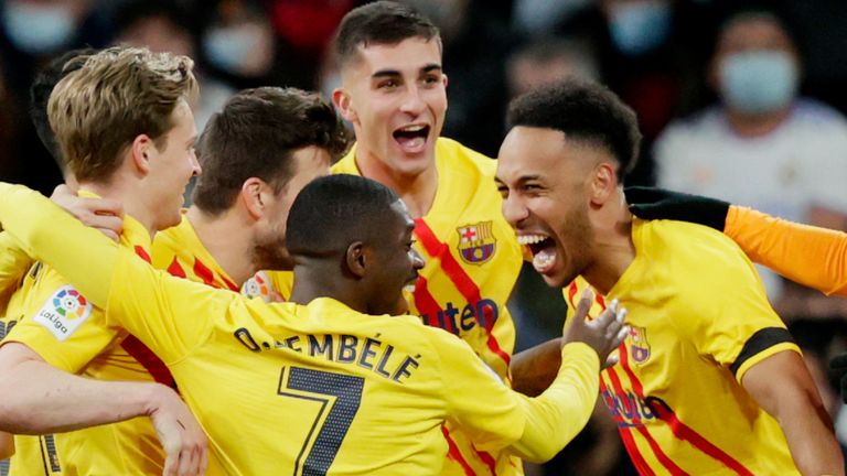 Pierre-Emerick Aubameyang celebrates scoring with his Barcelona teammates 