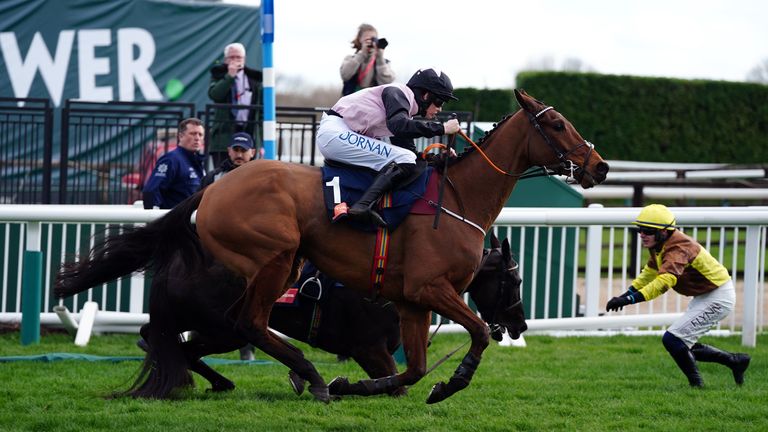 Bob Olinger strides past Galopin Des Champs and Paul Townend after their fall in the Turners Novices&#39; Chase