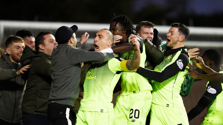 Celtic captain Scott Brown celebrates with the Celtic fans after he scores his side's first goal of the game during the Ladbrokes Scottish Premiership match at Rugby Park, Kilmarnock.