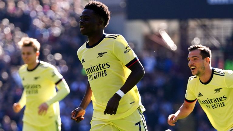 Arsenal&#39;s Bukayo Saka celebrates his opener at Villa Park