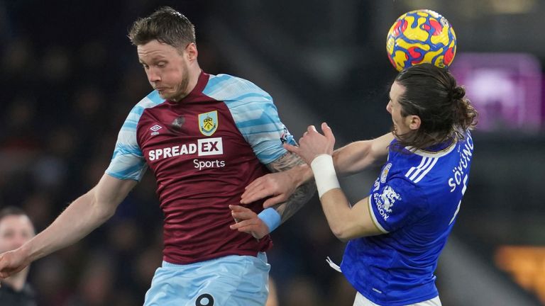 Burnley&#39;s Wout Weghorst vies for the ball with Leicester&#39;s Caglar Soyuncu