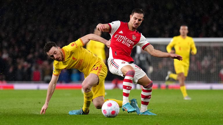 Cedric (right) has played in Arsenal's last seven Premier League games - the best run he's put in a Gunners shirt