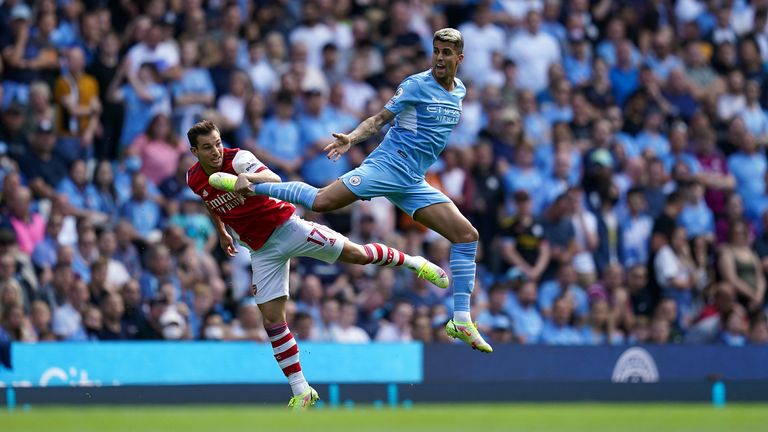 Cedric (left) and Arsenal had a difficult time up against Manchester City back in August