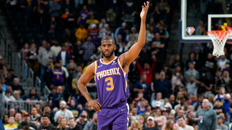 Phoenix Suns guard Chris Paul gestures to the crowd at the end of the team&#39;s NBA basketball game against the Denver Nuggets on Thursday, March 24, 2022, in Denver. (AP Photo/David Zalubowski)