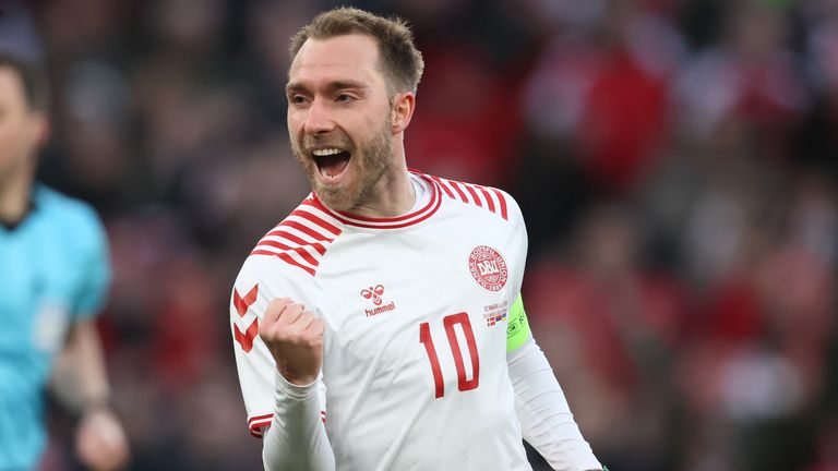 Christian Eriksen celebrates after scoring against Serbia