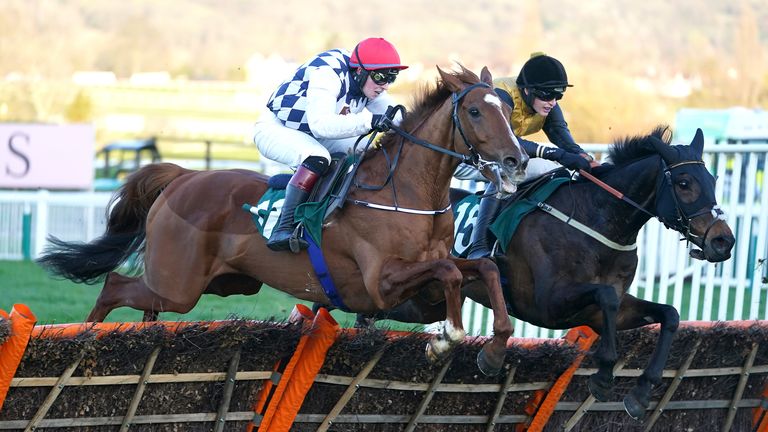 Cobblers Dream (far side) battles with Banbridge over the last in the Martin Pipe at the Cheltenham Festival