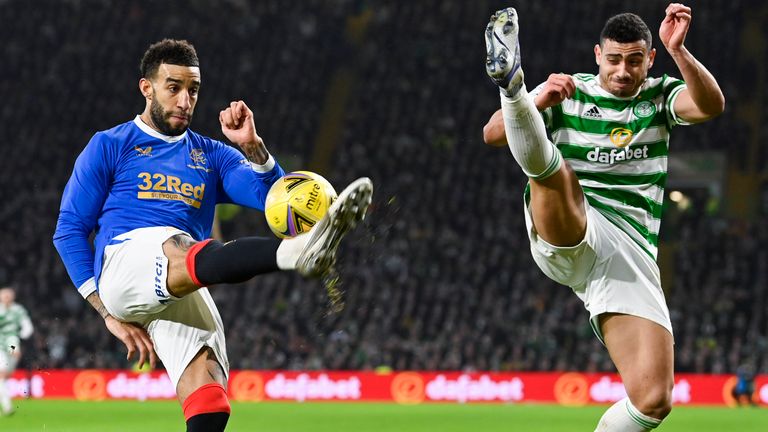 GLASGOW, SCOTLAND - FEBRUARY 02: Rangers' Connor Goldson (L) and Celtic's Giorgos Giakoumakis during a cinch Premiership match between Celtic and Rangers at Celtic Park, on February 02, 2022, in Glasgow, Scotland. (Photo by Rob Casey / SNS Group)