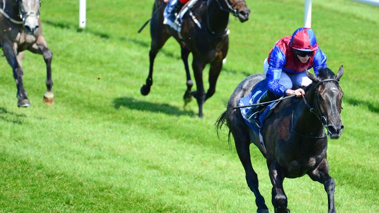 Contarelli Chapel and Ryan Moore win the Irish Stallion Farms EBF Fillies Maiden at Naas