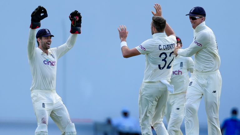 Ben Fox and Craig Overton celebrate the removal of John Campbell from the West Indies