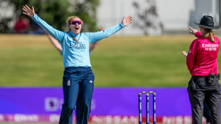 Sophie Ecclestone of England celebrates after taking a wicket during the women&#39;s world cup cricket match between England and India at Bay Oval, Mt Maunganui, New Zealand, Wednesday, March 16, 2022. (John Cowpland/Photosport via AP)


