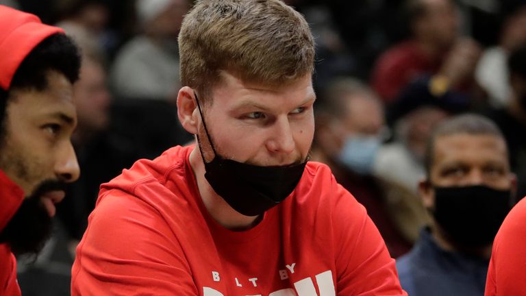 Davis Bertans pictured on the sideline for the Washington Wizards in February 2022 prior to his move at the trade deadline