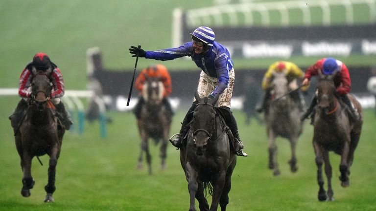 Paul Townend celebrates as Energumene wins the Champion Chase