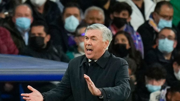 Real Madrid's head coach Carlo Ancelotti gestures during the Champions League, round of 16, second leg soccer match between Real Madrid and Paris Saint-Germain at the Santiago Bernabeu stadium in Madrid, Spain, Wednesday, March 9, 2022. (AP Photo/Manu Fernandez)


